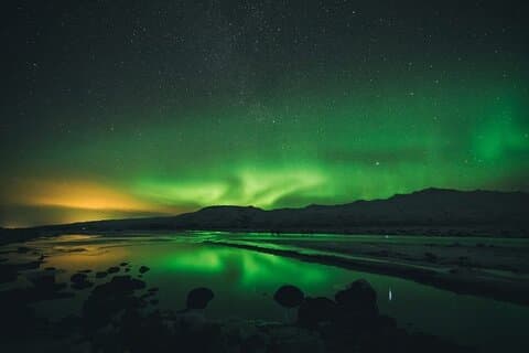 Every light tells a story. In Iceland, the Northern Lights whisper tales of the Arctic sky — glowing, shifting, and endlessly beautiful.