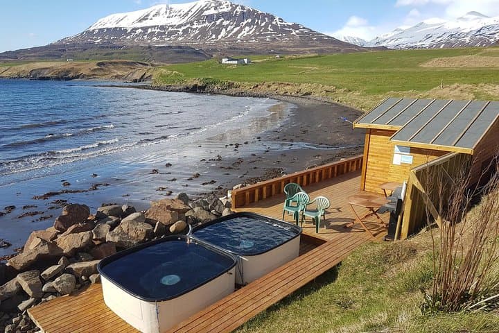 You will also find in Hauganes geothermally heated hot tubs