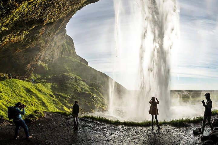 Walking behind Seljalandsfoss waterfall offers amazing photo opportunities