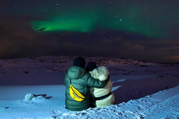 Romantic moment under the northern lights