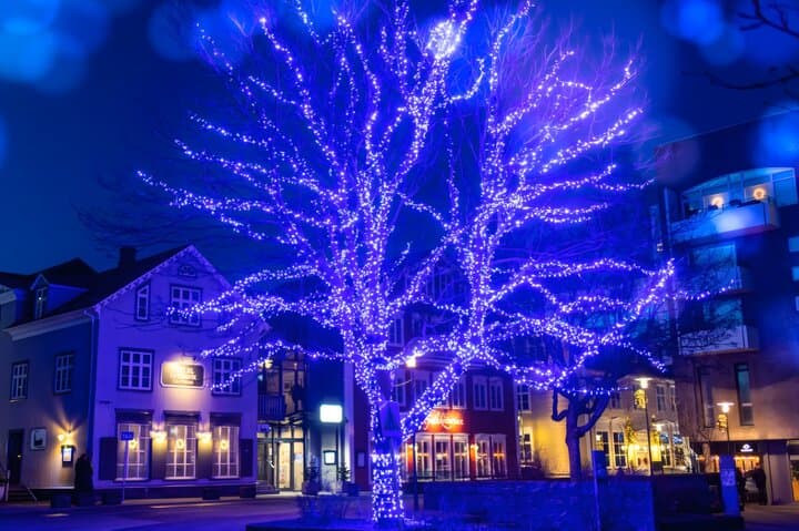 The festively lit streets of downtown Reykjavik in the winter