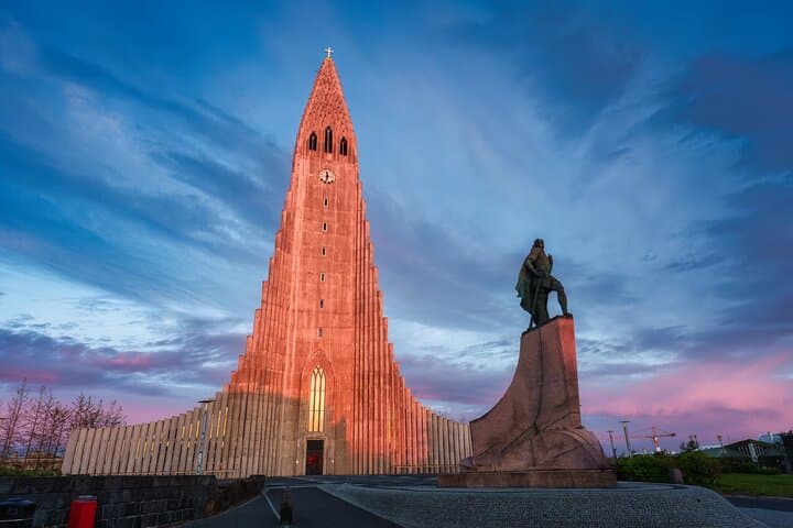 Hallgrímskirkja: The iconic Lutheran church and statue of Leif Erikson, symbols of Iceland.