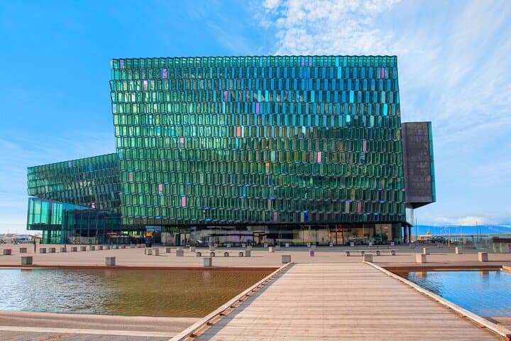 Harpa Concert Hall: The jewel of modern architecture with its honeycomb glass facade inspired by Icelandic landscapes.