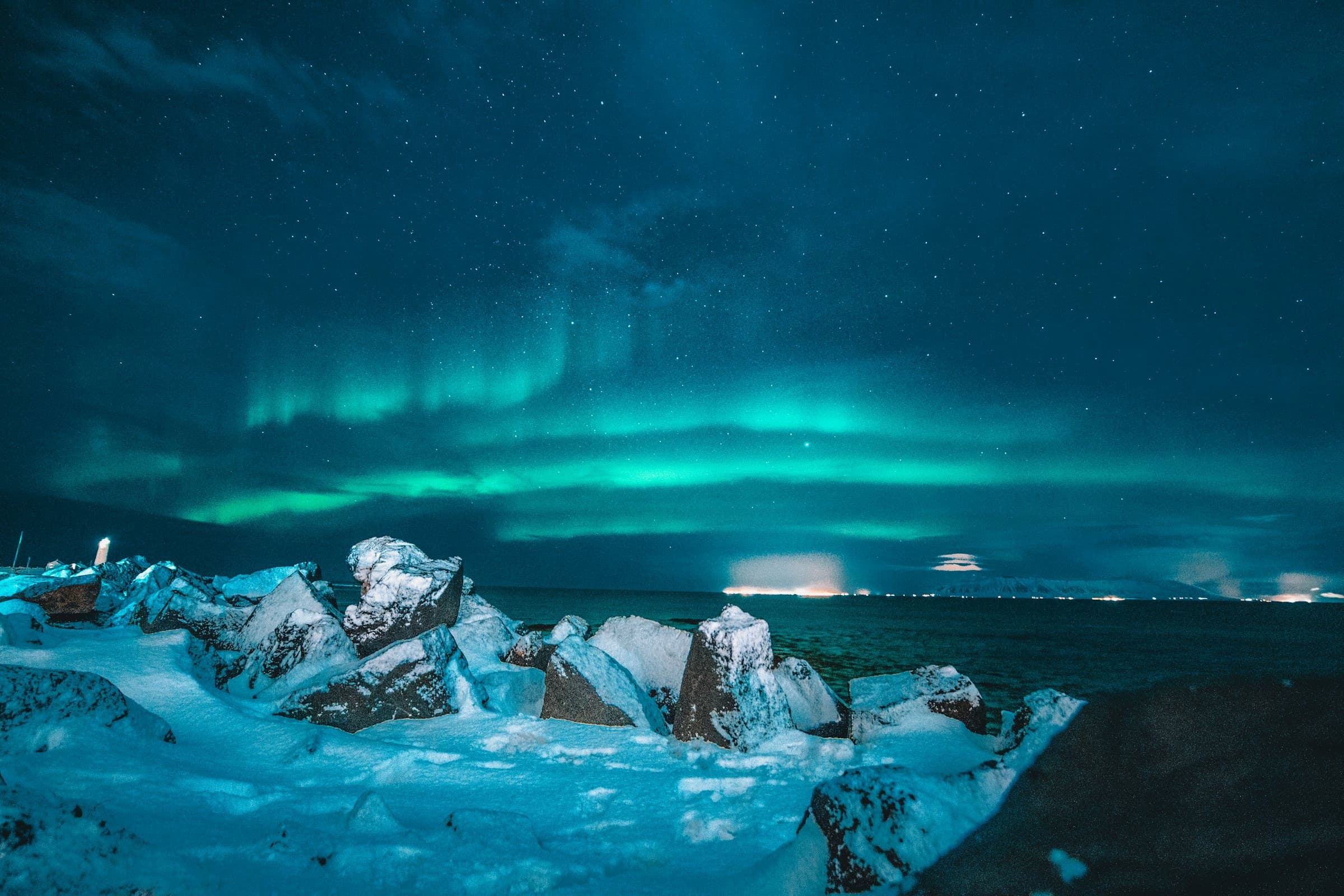 The Northern Lights over an Icelandic landscape