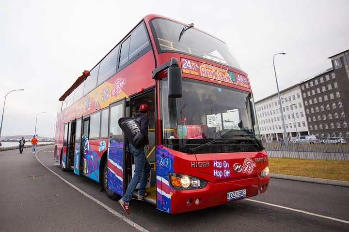 Double-decker buses pick up and drop off passengers at 15 stops around the city.