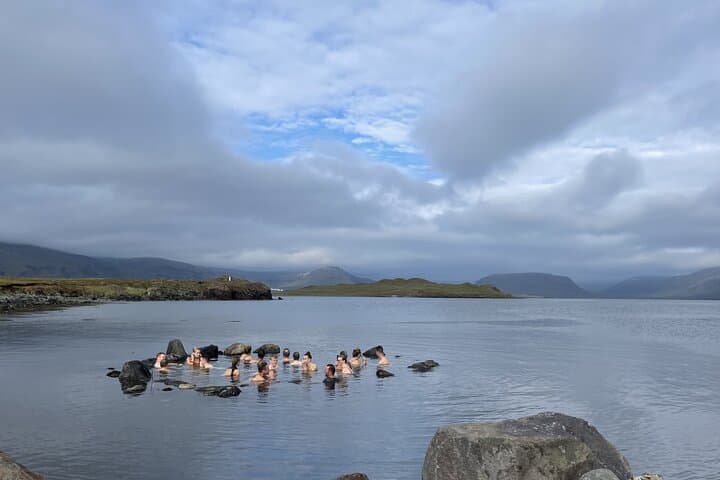 Experience traditional Icelandic bathing culture as you take a bath in the serene hot springs