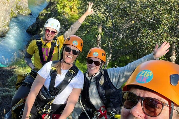 Happy group of friends on a zipline tour.