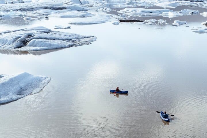 Kayaking around icebergs