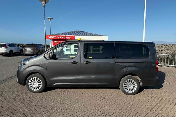 Spacious 8-passengers van with extra room for luggage.