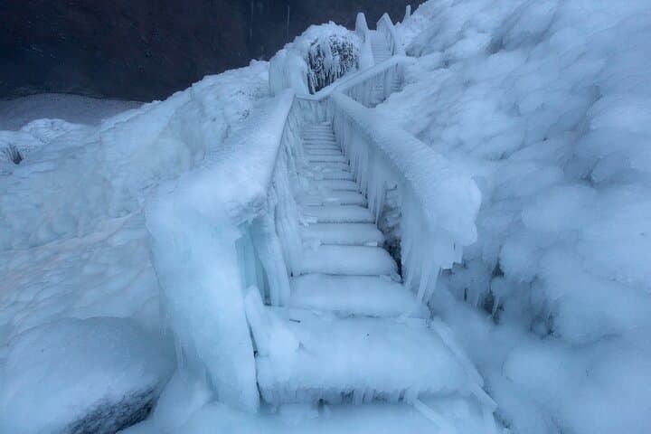 Skogafoss Waterfall has a staircase beside it, and in winter the steps can become frozen due to ice and snow.