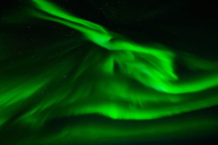 Northern Lights Small-Group Tour with Photos, Snacks & Snowsuits